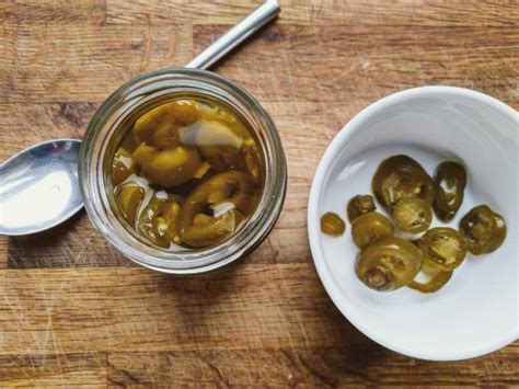 pickled-jalapenos-with-garlic-recipe-preserve-pickle image