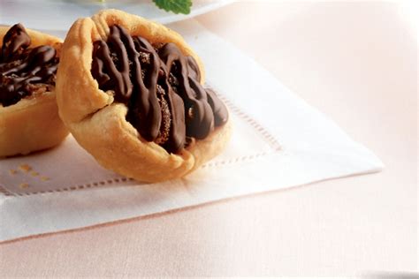 chocolate-pecan-tarts-canadian-goodness-dairy image