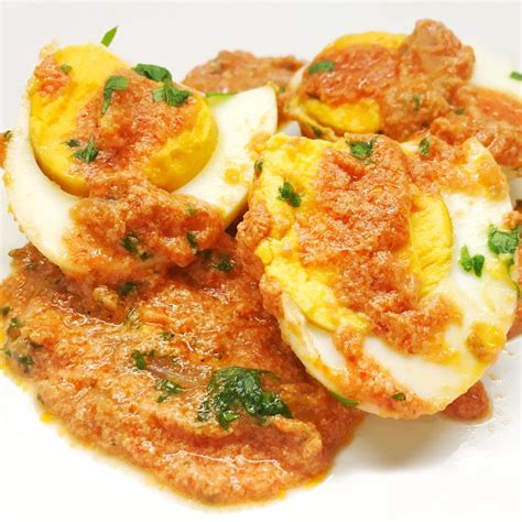 hard-boiled-eggs-in-tomato-sauce-easy-recipe-mamma image
