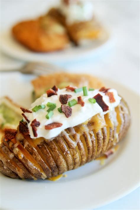 cheddar-ranch-hasselback-potatoes-the-tasty-bite image