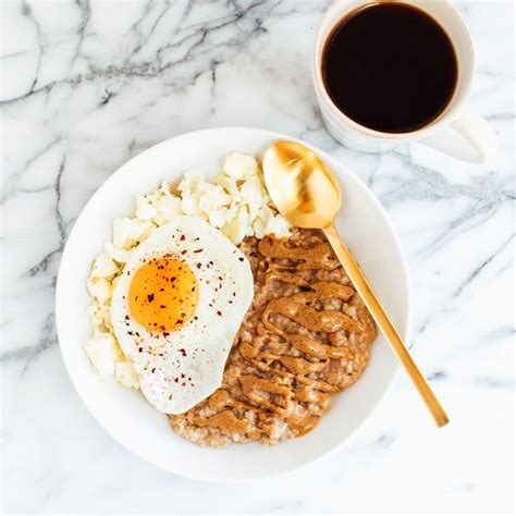 sweet-savory-egg-and-oatmeal-combo-bowl-eating image