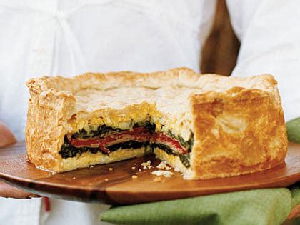 layered-torta-with-ham-provolone-spinach-herbs image