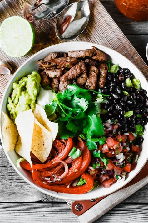 cilantro-lime-steak-burrito-bowl-salad-the-delicious-spoon image