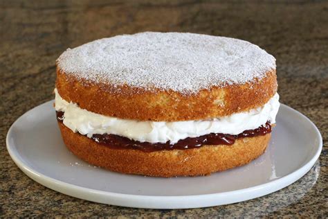 queen-cake-with-whipped-cream-and-jam-filling image