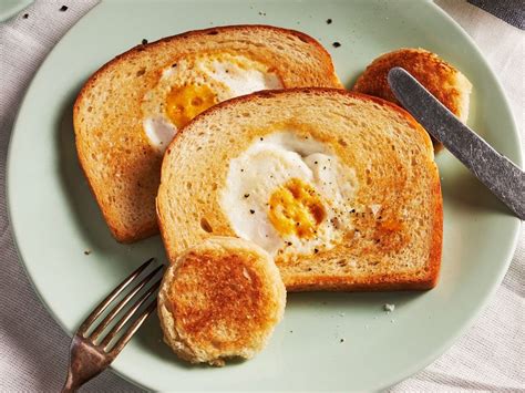 how-to-make-eggs-in-a-basket-delish image