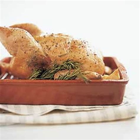 garlic-rosemary-roast-chicken-with-jus-cooks-illustrated image