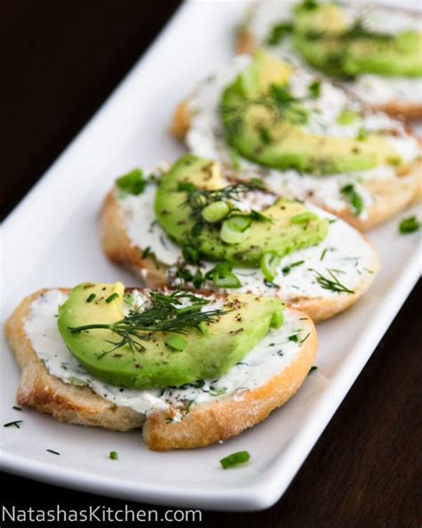 canapes-with-garlic-herb-cream-cheese-and-avocado image