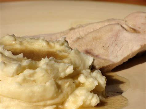 slow-roasted-turkey-breast-with-gravy-tasty-kitchen image