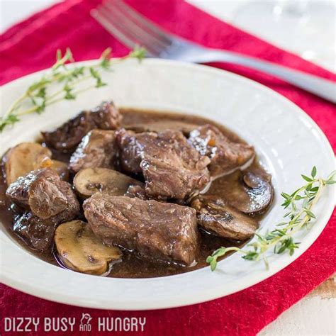 crock-pot-beef-and-mushrooms-with-red-wine-sauce image