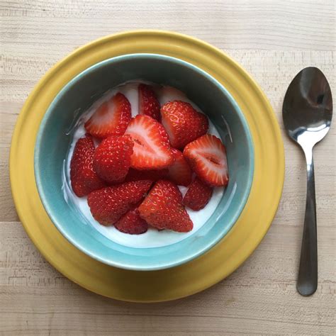 greek-yogurt-with-strawberries-recipe-eatingwell image