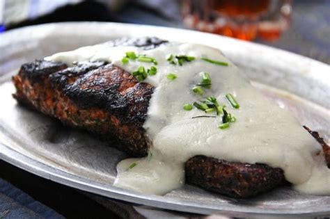 blackened-salmon-topped-with-danish-blue-cheese image