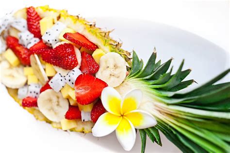 tropical-fruit-salad-in-a-pineapple-boat-recipe-live image