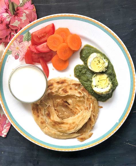 try-this-hariyali-egg-curry-malabar-parotta-for-dinner image