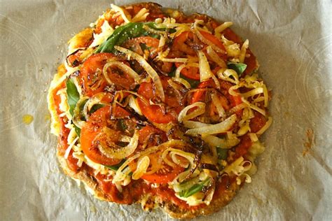 onion-pizza-with-tomato-and-basil-cooking-on-the image