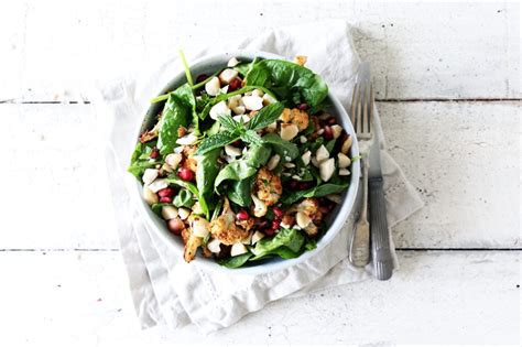 spiced-cauliflower-and-spinach-salad-with-brazil-nuts image