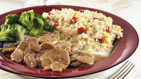 saucy-pork-medallions-with-spiced-couscous image