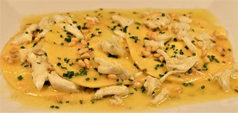 crab-corn-raviolo-with-citrus-ginger-butter-sauce image