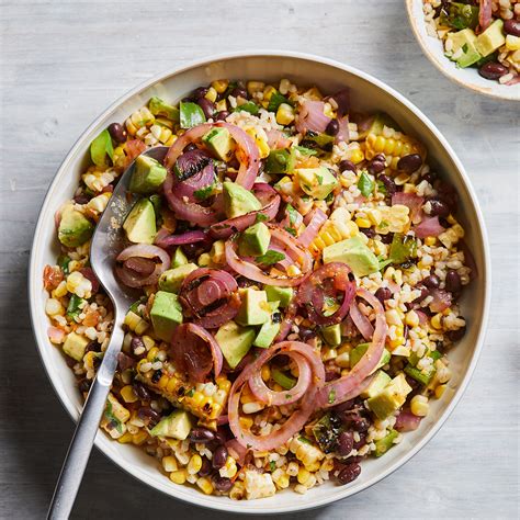 grilled-corn-salad-with-black-beans-rice-eatingwell image