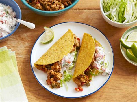 ground-chicken-tacos-with-creamy-salsa-food-network image