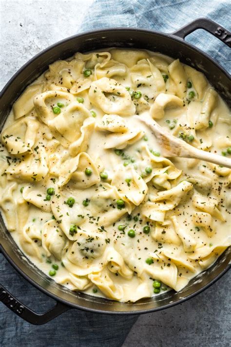 creamy-tortellini-alfredo-with-peas-nourish-and-fete image