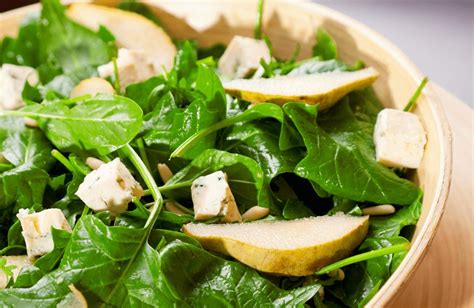 spinach-and-pear-salad-with-dijon-vinaigrette image