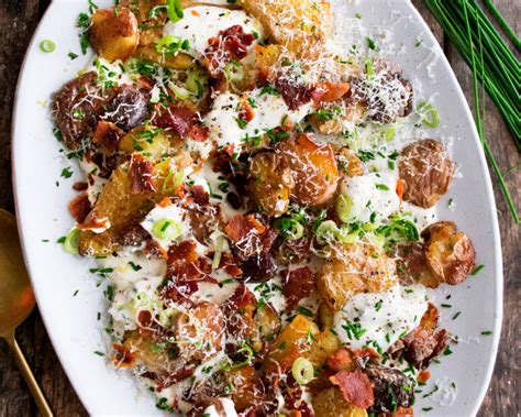loaded-smashed-potatoes-with-bacon-parmesan image