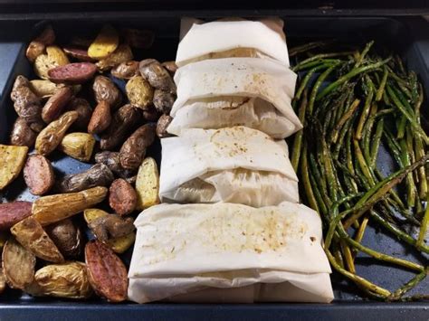 paper-wrapped-halibut-with-veggies-sheet-pan-dinner image