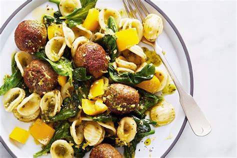 pesto-meatballs-with-peppers-and-greens-canadian-living image