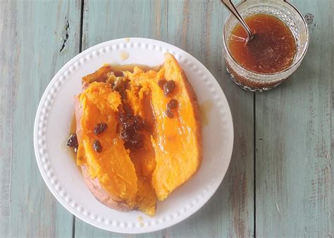 baked-sweet-potato-wrum-raisin-sauce-syrup-and image