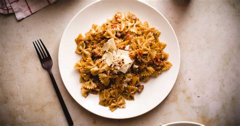 easy-one-pan-spicy-sausage-farfalle-the-inspired-home image