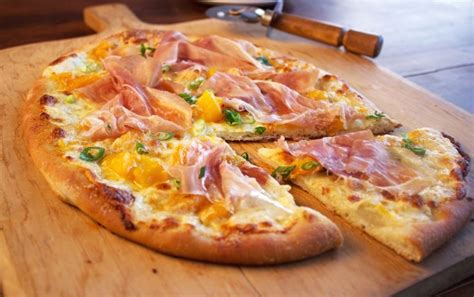 prosciutto-pizza-with-spicy-peach-jam-and-burrata image
