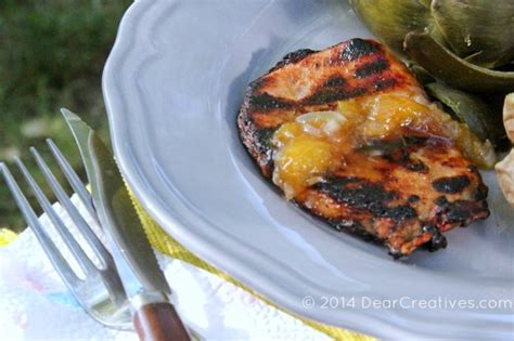 grilled-pork-chops-with-peach-honey-glaze image
