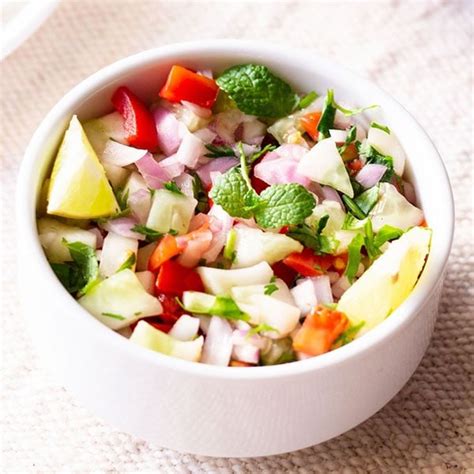 indian-kachumber-salad-cucumber-tomato-onion-salad image