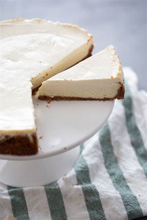 classic-cheesecake-with-sour-cream-topping image