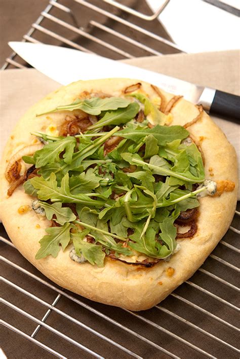 arugula-pizza-balsamic-glazed-onions-and-blue-cheese image