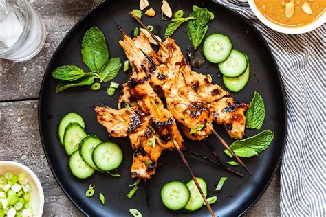 grilled-chicken-satay-with-peanut-sauce-recipe-simply image