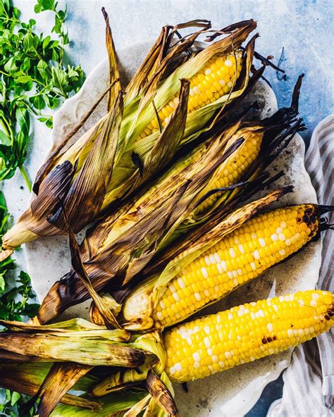 how-to-grill-corn-in-the-husk-a-couple-cooks image