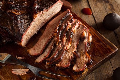 how-to-cook-brisket-on-a-charcoal-grill-better-homes image