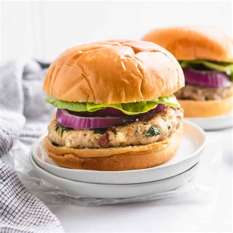 spinach-feta-turkey-burgers-with-sun-dried-tomatoes image
