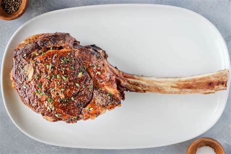 tomahawk-rib-eye-steak-recipe-the-spruce-eats image