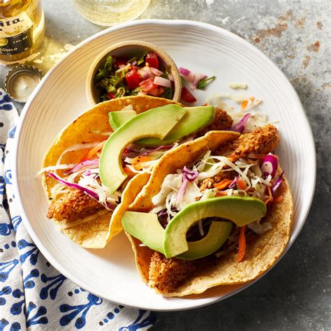 crispy-oven-fried-fish-tacos-recipe-eatingwell image