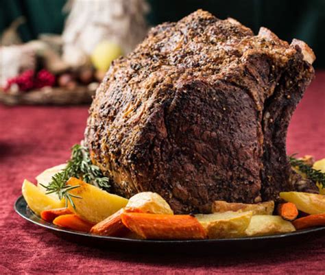 herb-crusted-beef-rib-roast-with-potatoes-carrots-and image