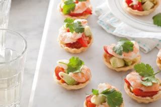mini-prawn-and-avocado-tartlets-recipe-good-food image