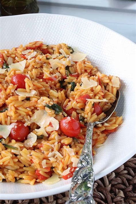 one-pan-orzo-with-tomatoes-spinach-and-basil image