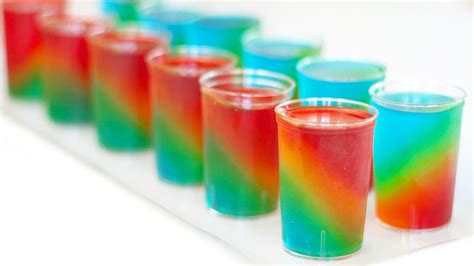 slanted-rainbow-jello-shots-recipe-tablespooncom image