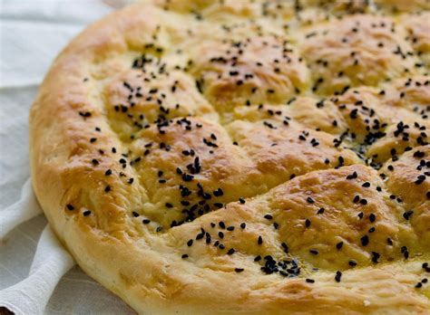 turkish-ramadan-flat-bread-pide-recipe-the-spruce image