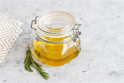 fresh-herb-infused-rosemary-oil-recipe-the-spruce-eats image