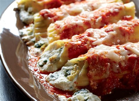 spinach-and-artichoke-manicotti-recipe-eat-this-not-that image