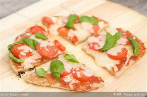 grilled-tomato-and-mozzarella-pizza-with-basil image