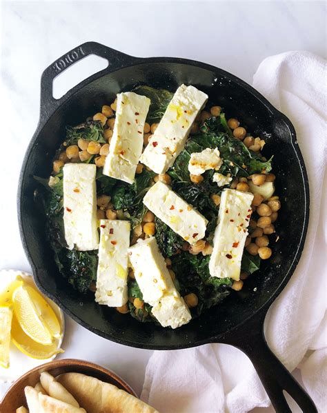 baked-feta-with-garlicky-kale-and-chickpeas-purewow image